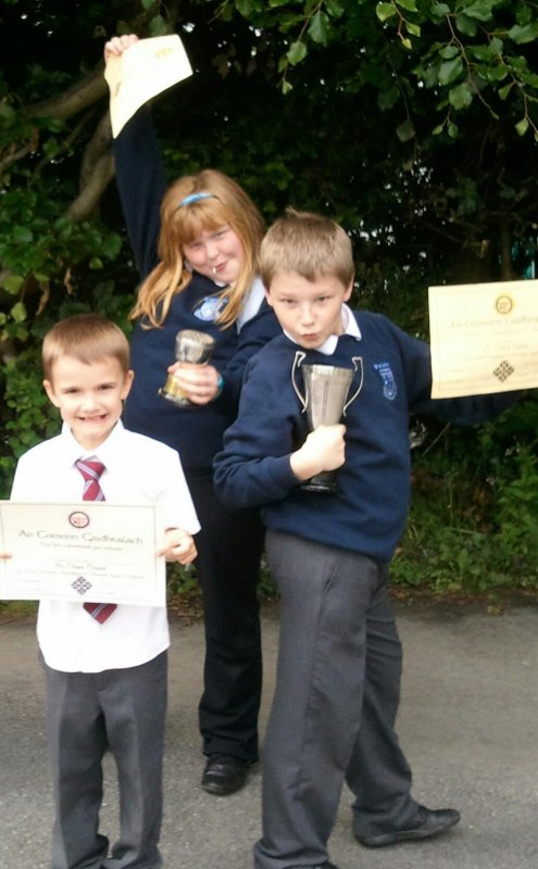 Pupils from Goodlyburn Gaelic Medium class, Perth, with some of their trophies. 2011